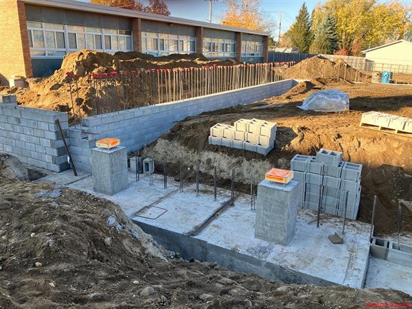 Footings and rebar for classroom addition and storm shelter 